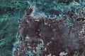 Weathered shabby concrete wall texture with teal blue paint