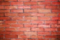 Weathered stained old brick wall with cracks and scratches. Brickwork Royalty Free Stock Photo