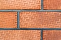 Weathered stained old red brick wall background. Close-up. Royalty Free Stock Photo