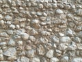 Weathered stained old stone brick wall and  gradually wear away. Royalty Free Stock Photo