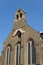 The weathered stone exterior of St Mary Magdalene Church of England church Royalty Free Stock Photo