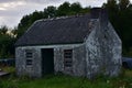 Weathered stone house at night