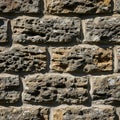 Of a weathered stone wall featuring irregular and rough textured Royalty Free Stock Photo