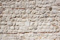 Weathered Stonewall Background from a Castle Wall Royalty Free Stock Photo