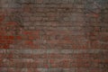 Weathered texture of stained old dark brown and red brick wall background, grungy rusty blocks of stone-work technolog Royalty Free Stock Photo