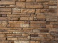 Weathered texture of a stained old modern dark brown and red brick wall background Royalty Free Stock Photo