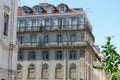 Weathered vintage facades of old worn buildings in the centre of Lisbon, Portugal