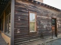 Weathered wall on old west building Royalty Free Stock Photo