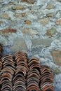 Weathered wall with rugged stone texture and stacked tiles Royalty Free Stock Photo