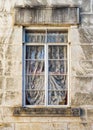 Weathered Window in a Limestone Wall Royalty Free Stock Photo