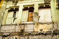 Weathered windows in asian backstreet