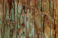 Weathered wood background, natural vintage grunge texture with paint of faded shades of blue green, aqua and turquoise over natura