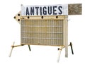 Weathered wood and metal ANTIGUES [sic] sign Royalty Free Stock Photo