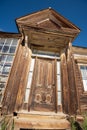 Weathered wooden  antique house door ghost town Bodie, California, USA Royalty Free Stock Photo