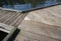 Weathered wooden boardwalk with three converging paths