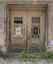Weathered Wooden Doors on Abandoned Building Royalty Free Stock Photo