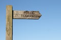 Weathered wooden footpath sign Royalty Free Stock Photo