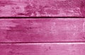 Weathered wooden painted wall in pink tone Royalty Free Stock Photo