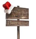 Weathered wooden sign with Santa hat on white Royalty Free Stock Photo