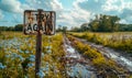 Weathered and worn TRY AGAIN sign stands by a country road, symbolizing persistence, second chances, motivation, and the