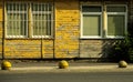 weathered yellow wood facade