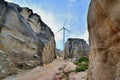 Weathering granite canyon and windmill Royalty Free Stock Photo