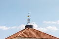 Weathervane in the form of gold fish on the roof of Tabgha - the Catholic Church Multiplication of bread and fish