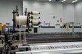 Weaving automatic machines - Weaving is a method of textile production in which two distinct sets of yarns or threads are