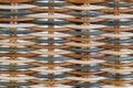 Weaving from a colored vine. handmade wickerwork pattern