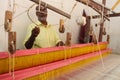 Weaving or Handloom Industry in India. Textile handicraft artisans. Spinning Cotton into thread.