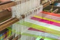 Weaving loom and shuttle on the warp Royalty Free Stock Photo