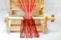 Weaving mini machine for making belts with patterns. Folk art, handmade. Detail. Royalty Free Stock Photo