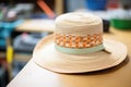 weaving a new pattern into a boater hat Royalty Free Stock Photo