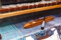 Weaving shuttle on the blue warp in weaving machine Royalty Free Stock Photo