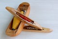 Weaving shuttle, Weaving loom and shuttle on the warp Royalty Free Stock Photo