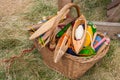 Weaving shuttles and multi-colored yarn in a basket