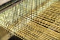 Weaving silk in traditional way in Vietnam. Vietnamese silk processing