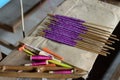 Weaving threads spun onto bobbins