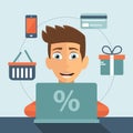 On line shopping concept. Man sitting in front of his lap top and searching for products to buy. Shopping icons. Royalty Free Stock Photo