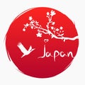 Grunge style. Love Japan. A branch with sakura flowers and a flying Japanese crane on the background of the red sun. Sakura and Re