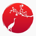 Red flag of Japan. A branch with sakura flowers and a Japanese crane on the background of the red sun. Crabe Royalty Free Stock Photo