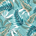 Trendy seamless pattern with colorful tropical leaves and flowers on a pastel blue background. Vector design. Jung print. Floral b Royalty Free Stock Photo