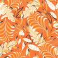 Summer bright seamless pattern with tropical leaves and plants on orange background. Vector design. Jung print. Floral background.