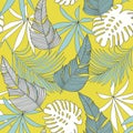 Trendy abstract seamless pattern with colorful tropical leaves and flowers on a gentle background. Vector design. Jungle print. Fl Royalty Free Stock Photo