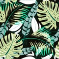 Abstract trend seamless pattern with bright tropical leaves and plants. Vector design. Jungle print. Floral background. Printing a Royalty Free Stock Photo