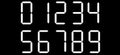 Vector Calculator digital numbers . Black background with white numbers.