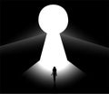 Woman silhouette walking into the light key hole door entrance Royalty Free Stock Photo