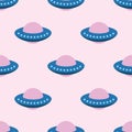 Ufo seamless pattern on a pink background