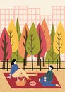 People spending time together in autumn city park. Colorful trees with orange, red and green leaves in the background.