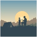 Nature, tent and sunrise. Silhouette of father and son, mountains, hills and forest on the sun and sky background. Wanderlust and